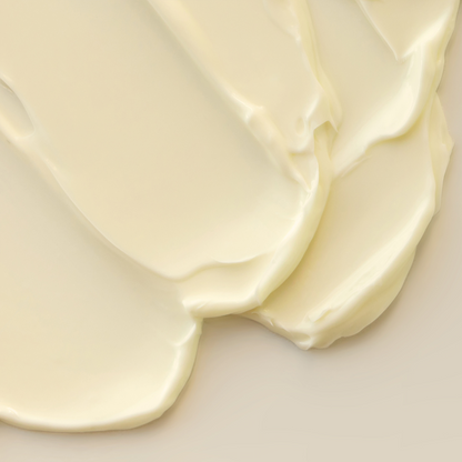 Close-up of smooth, creamy white substance on a light background
Golden Silk body butter in jar – YSL Mon Paris dupe, fruity floral scent, whipped texture

