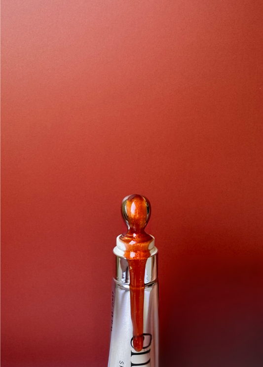 Brown tint lip oil.