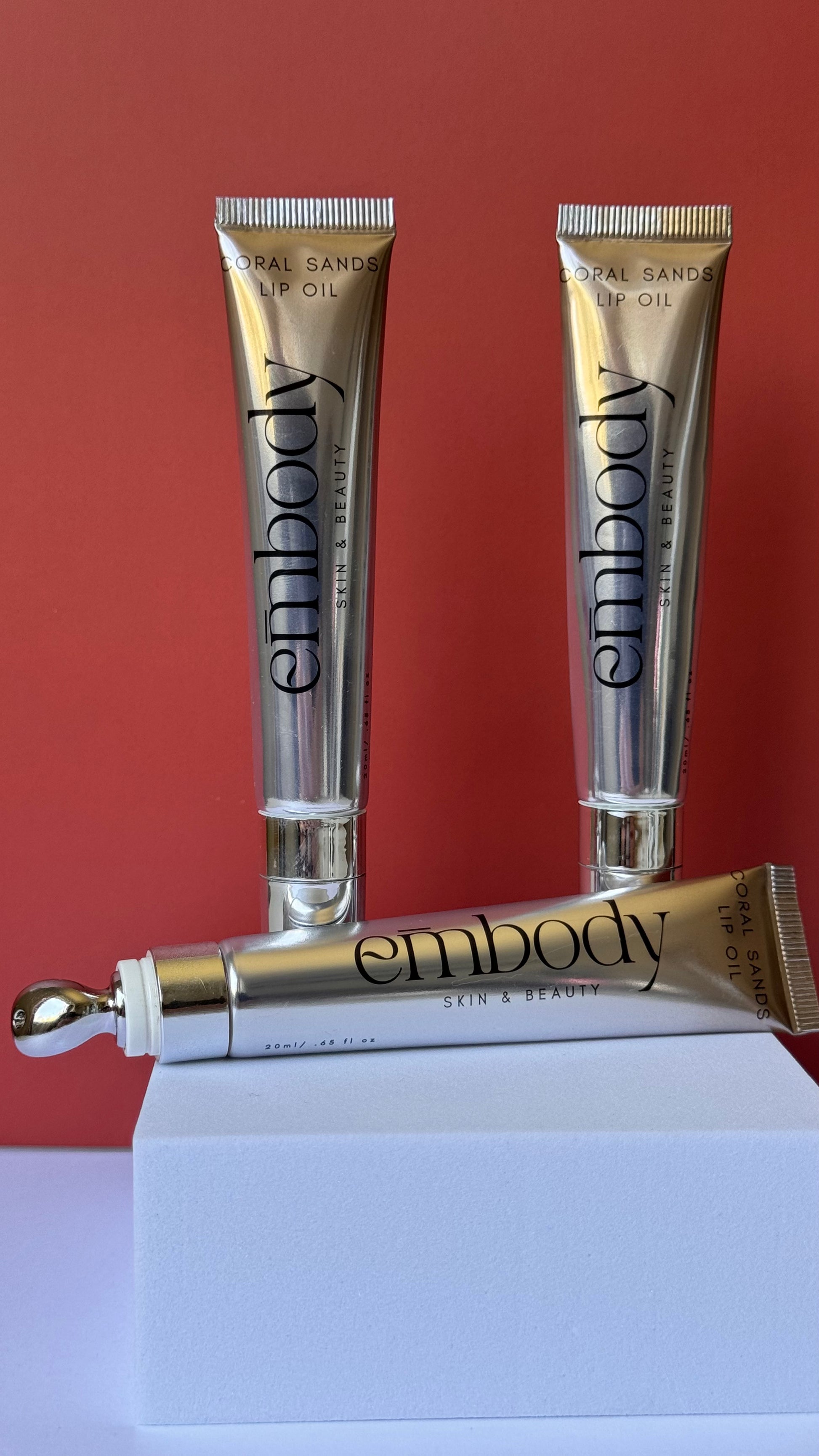 lip oil, brown tint, unique applicator head, luxury lip oil 